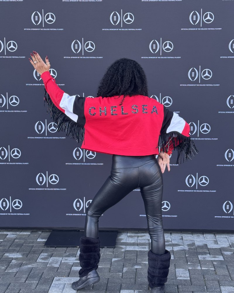 Chelsea from behind in her custom CHELSEA jersey at the Mercedes-Benz of Athens watch party
