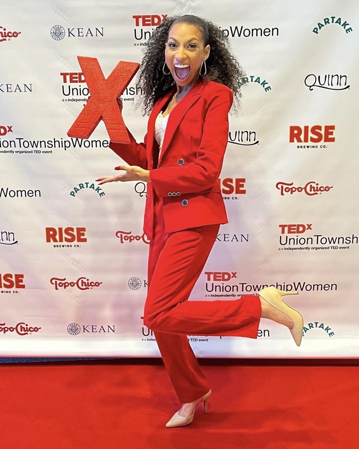 Chelsea mid-kick on the TEDx red carpet