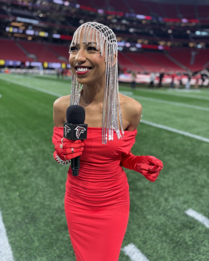 Chelsea on the field at Mercedes-Benz Stadium with a Falcons mic