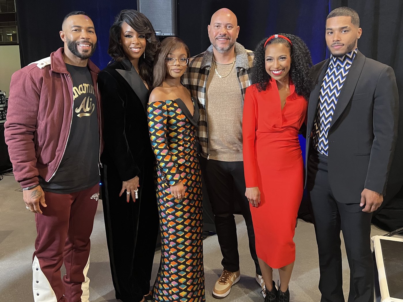Left to right: Omari Hardwick, Kelly Rowland, Marsai Martin, director Anton Cropper, Chelsea and Rome Flynn at the Fantasy Football Atlanta premiere